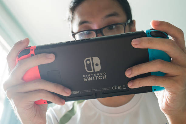 Man Playing Nitendo Switch